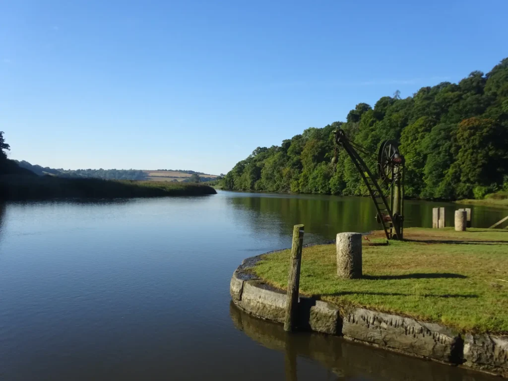 The peaceful River Tamar at Cotehele Quay on a hot summer morning