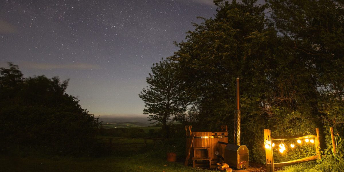 log fired hot tub at devon yurt