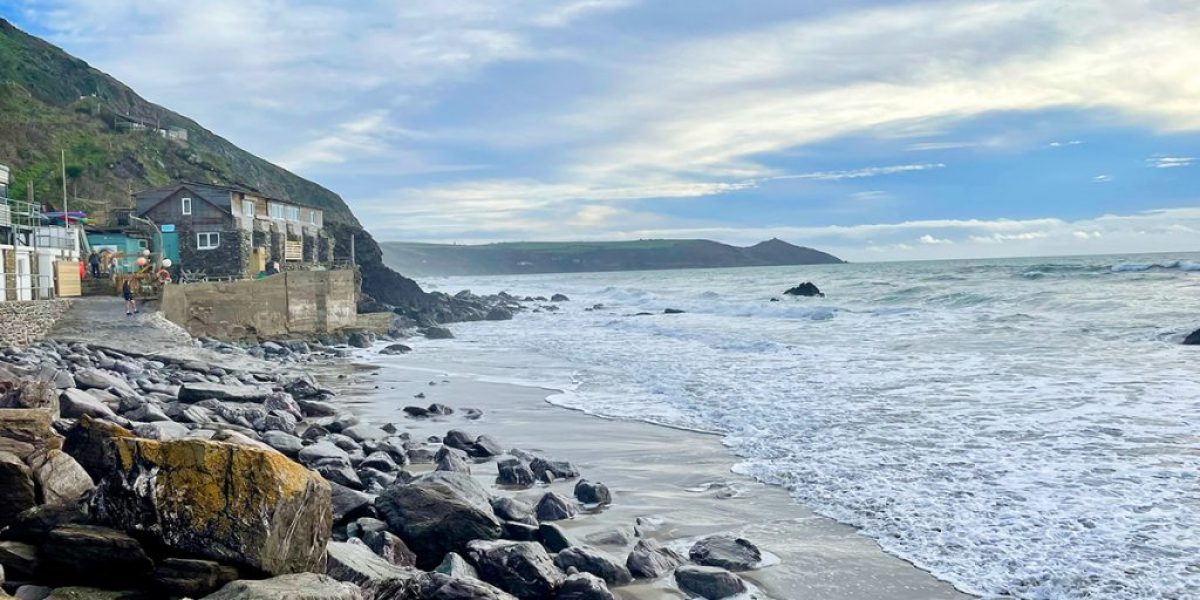 RAME PENINSULA - Surfers and beachgoers at Tregonhawke enjoying sunny days and café views